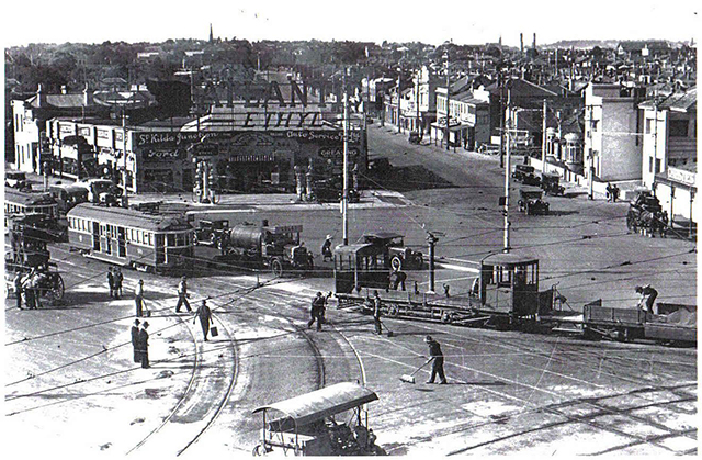 St Kilda Junction, in the background is the Junction Petrol Station  ca 1934